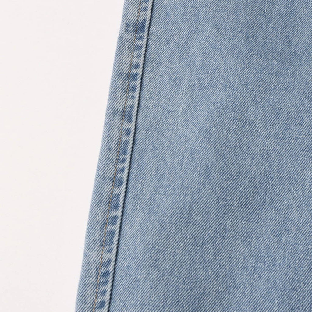 EXPOSED WAIST JEAN